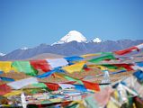 02 First View Of Mount Kailash With Prayer Flags The first view of Mount Kailash occurs after cresting a small hill.